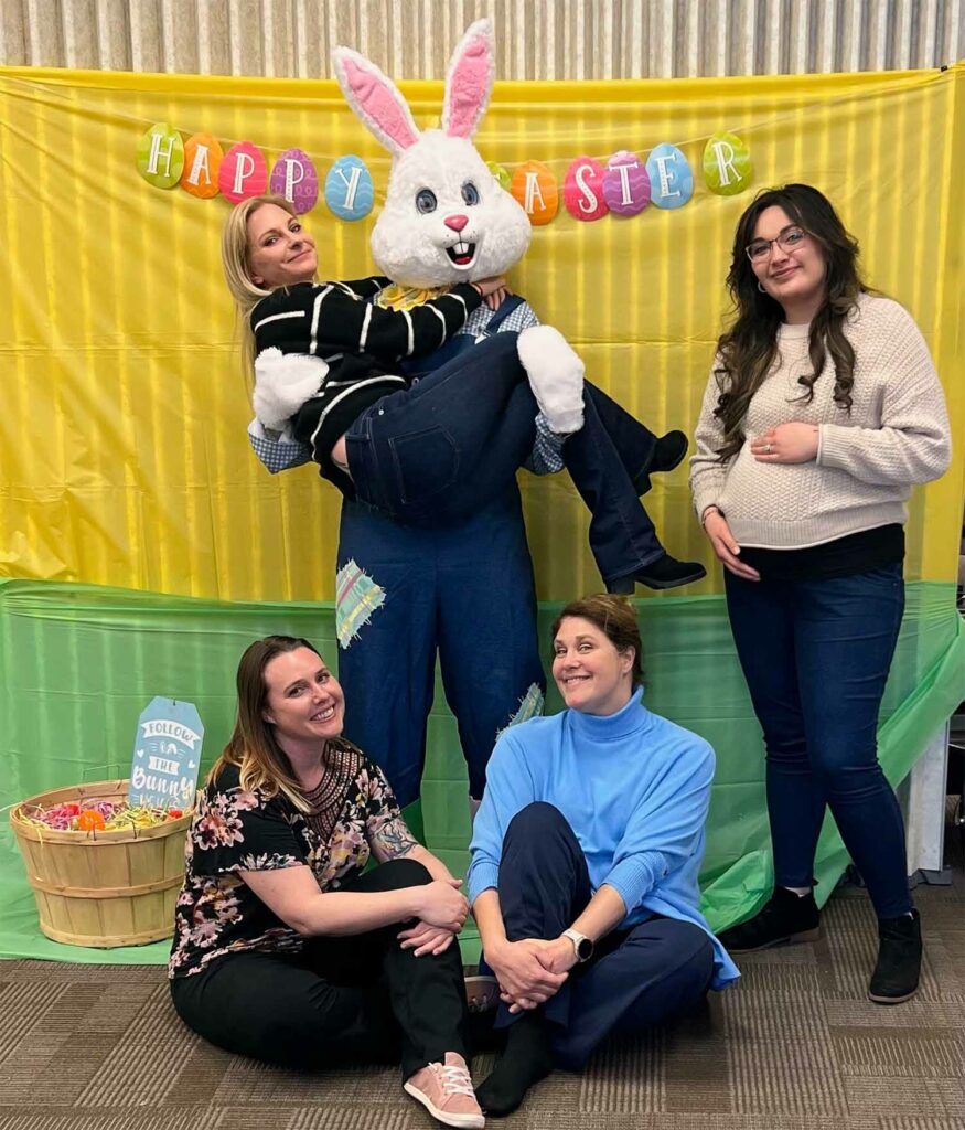 Team members with the easter bunny